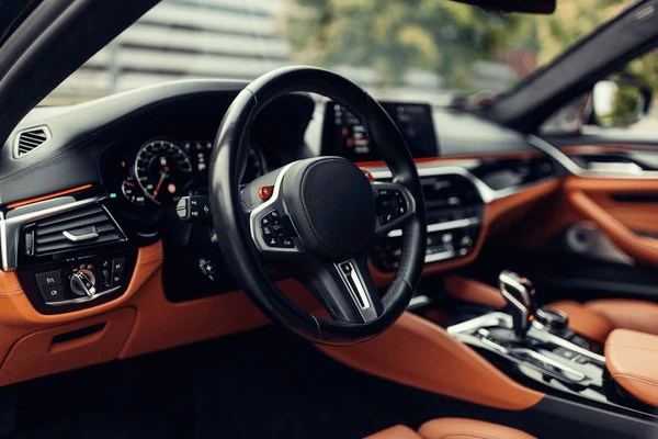 Clean minimalist interior of a car representing modern insurance technology
