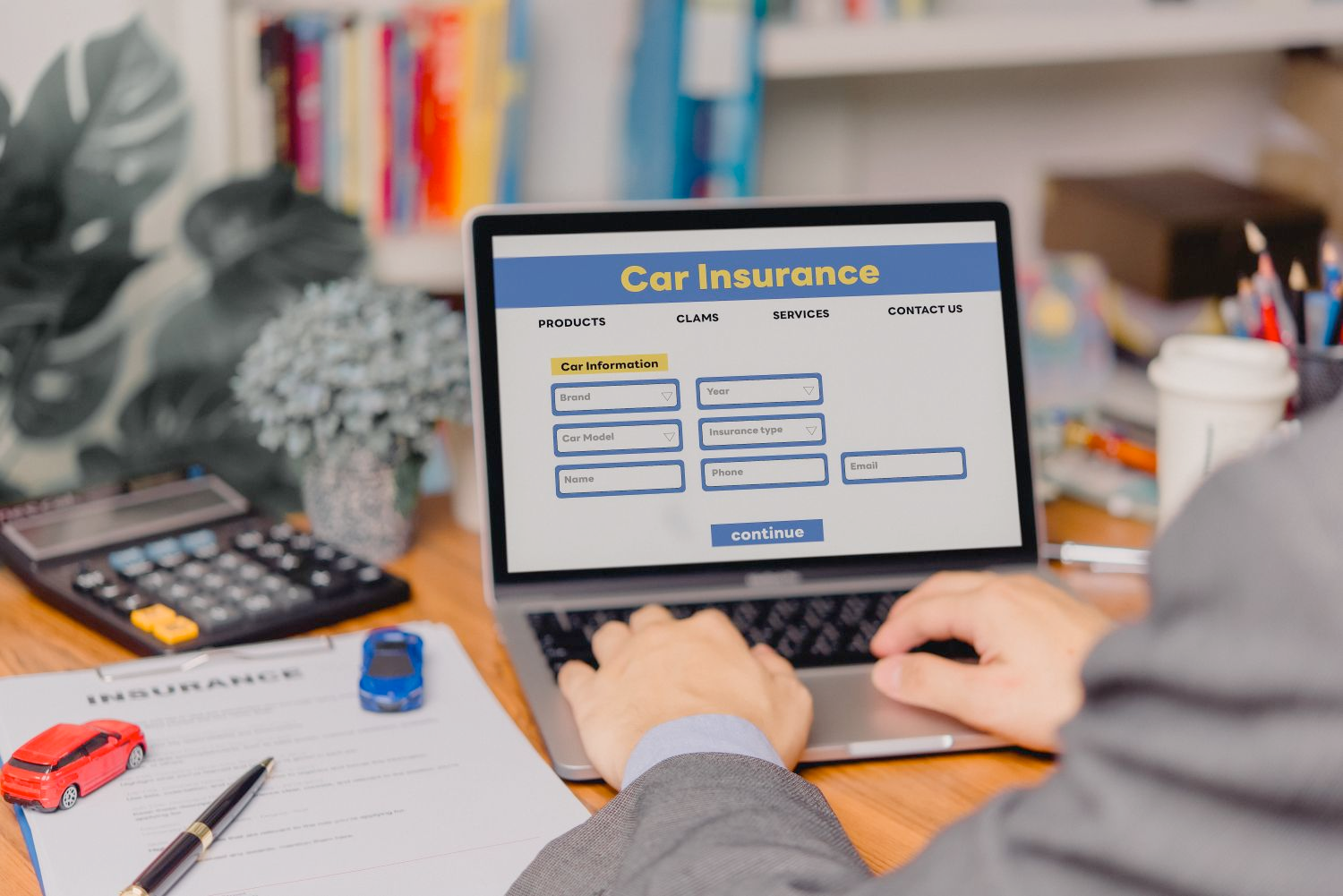 A professional reviewing car insurance rates on a clean digital interface